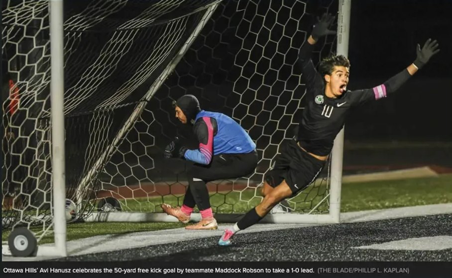 Avi Hanusz celebrating a teammate's 50-yard free kick goal for Ottawa Hills (The Blade / Phillip L. Kaplan)